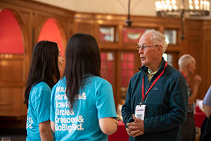 Three people talking