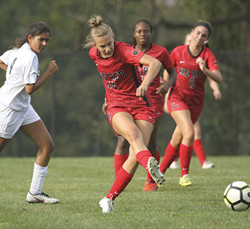 Photo of a soccer game. Links to Gifts of Appreciated Securities