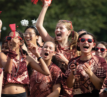 Photo of students cheering. Links to Gifts by Will